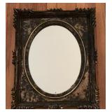 Vintage style ornate gold and black mirror with