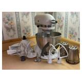 KitchenAid Mixer with extra mixing attachments.