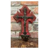 Ornate Metal Crucifix on Red Gothic Cross Wall