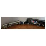 Two 1990s Semi Trucks & Trailers Lot