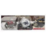 3 NIB NFL Mini Helmets