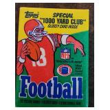 factory-sealed pack of 1986 Topps Football cards