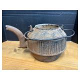 Antique cast iron tea kettle