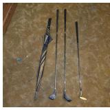 Golf Clubs and an Umbrella