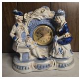 Ceramic Figurine Clock with Blue and White Accents