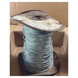 Spool of Galvanized Wire on Rusted Reel