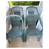 Four Green Plastic Patio Chairs