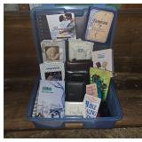 Plastic Storage Bin with Books and Accessories