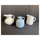 Three Ceramic Pitchers