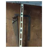 Saw, Level, and Square Tool Set on Pegboard