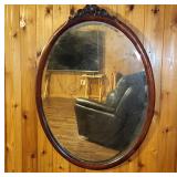 Oval Wood-Framed Wall Mirror