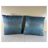Blue Throw Pillows with Embroidered Design