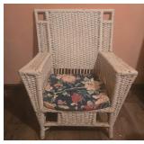 White Wicker Armchair with Floral Cushion