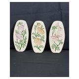 Three Floral Ceramic Wall Plaques