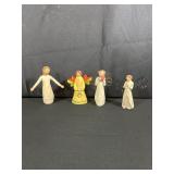 Four Angel Figurines in Various Styles