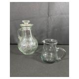 Two Clear Glass Pitchers