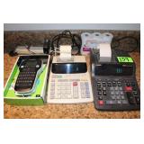 (2) Electronic Calculators, (1) Label Maker;