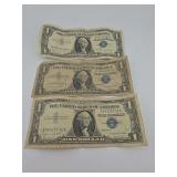 Three 1957A $1 Silver Certificates