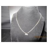 Fine silver tone necklace with small crystal