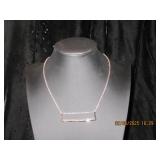 Gold tone bar necklace