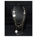 Shell and gold tone chain necklace