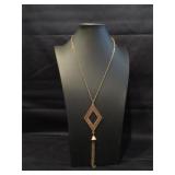 Silver tone necklace with a pink rose with a pearl