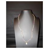 Small beads with red through pink and white