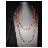 Long brown and gold beaded necklace