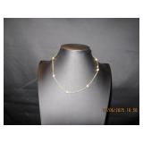 Gold tone with knots