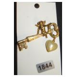 Gold-Tone Cherub and Key Brooch with Heart Charm