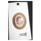 Oval Cameo-Style Brooch Featuring Woman's Face