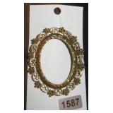 Oval Gold Tone Decorative Frame