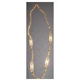 Gold and Black Bead Necklace with Silver Tassel