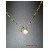 Gold Tone Necklace with Flower Toggle and Star Coi