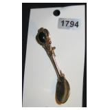 Gold-Tone Spoon Brooch with Dark Cabochon