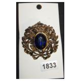 Gold-Tone Crown Wreath Brooch with Blue Rhinestone