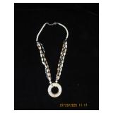 Multi-Strand Bead Necklace with Circular Pendant