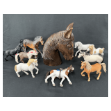 Assorted Equine Collection: Wooden Horse Head Sculpture with Accompanying Toy Figurines