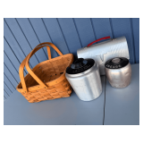 Assorted Kitchenalia Collection: Woven Basket, Aluminum Lunchbox, and Lidded Canisters