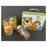 Assorted Character-Themed Collectibles: Yogi Bear Lunchbox and Camp Snoopy Glasses