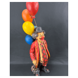 Clowning Around: Figural Clown Statue Holding Balloons