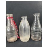 Group of Three Clear Glass Milk Bottles