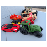 Assorted Toy Vehicle Collection Including Tractor, Sports Car, and Airplane