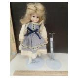 Heritage  Mint Collection Porcelain Doll damaged