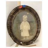 Oval Wood Frame Child In Nightgown Photo