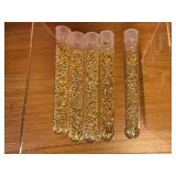 5 Tubes Filled With Gold Foil