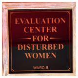 'Evaluation Center for Disturbed Women' Glass Sign