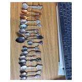 16 collectible spoons 4 foreign & cave adventures