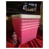 Five medium storage boxes with lids and on wheels