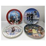 Four collector plates, Disney and The Beatles.
